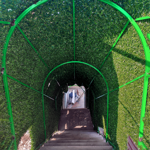 artificail-grass-on-fene-ezgif.com-resize-min